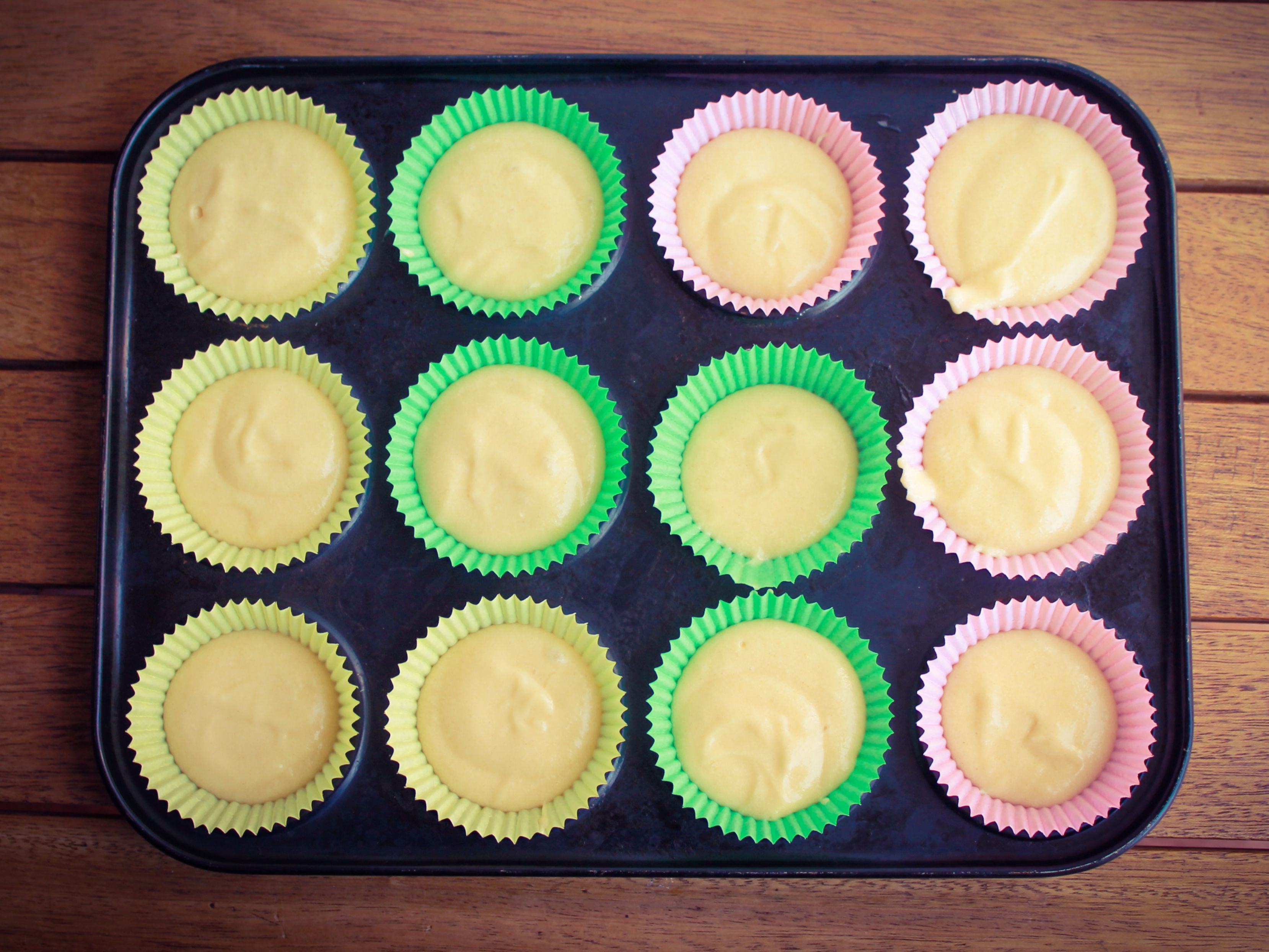 Cupcake batter measured by eyeball using a tablespoon scoop